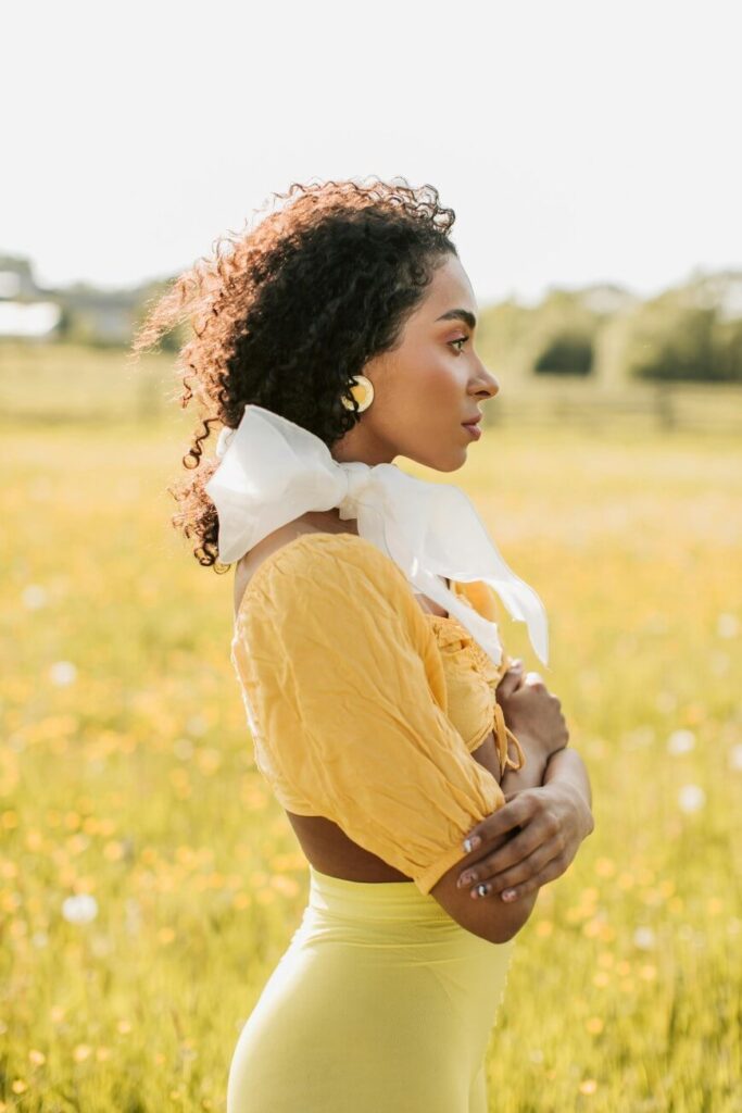 woman wearing yellow bow